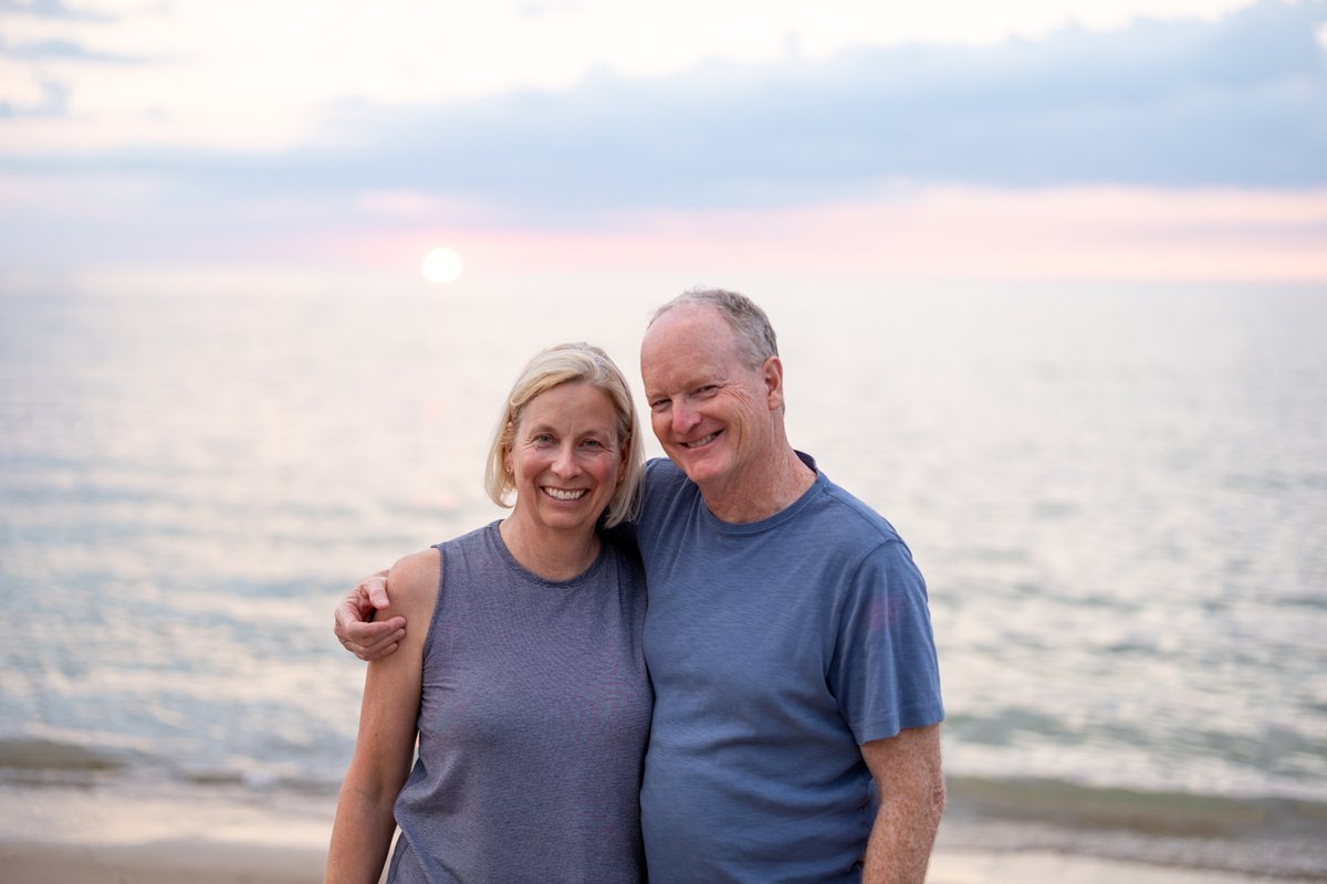 Couple on the beach at sunset
