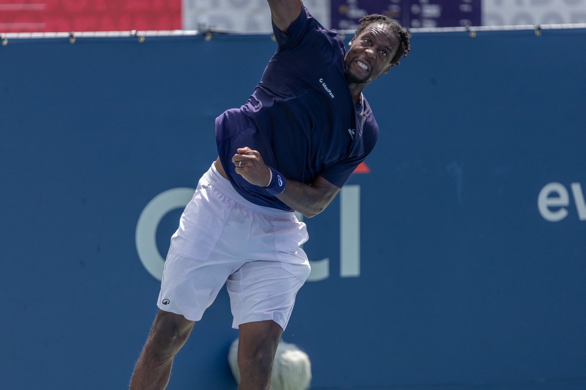 Tennis player serving