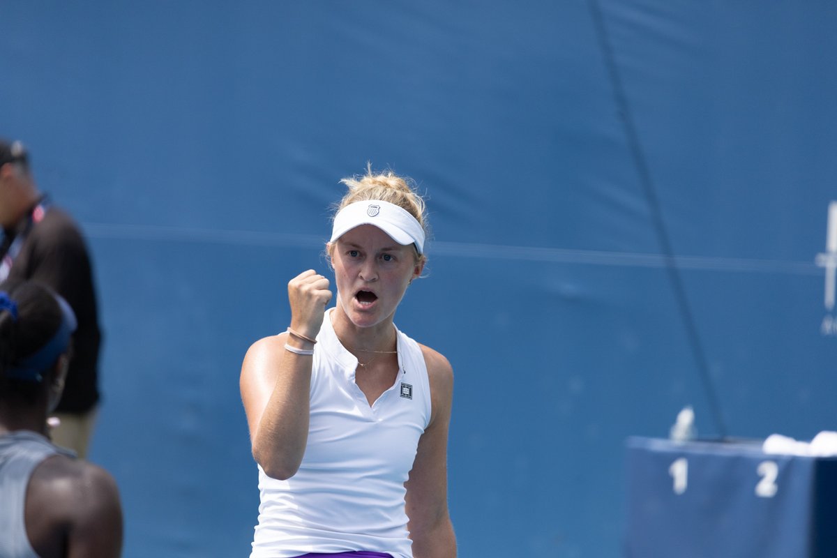 Tennis player celebrating with a fist pump